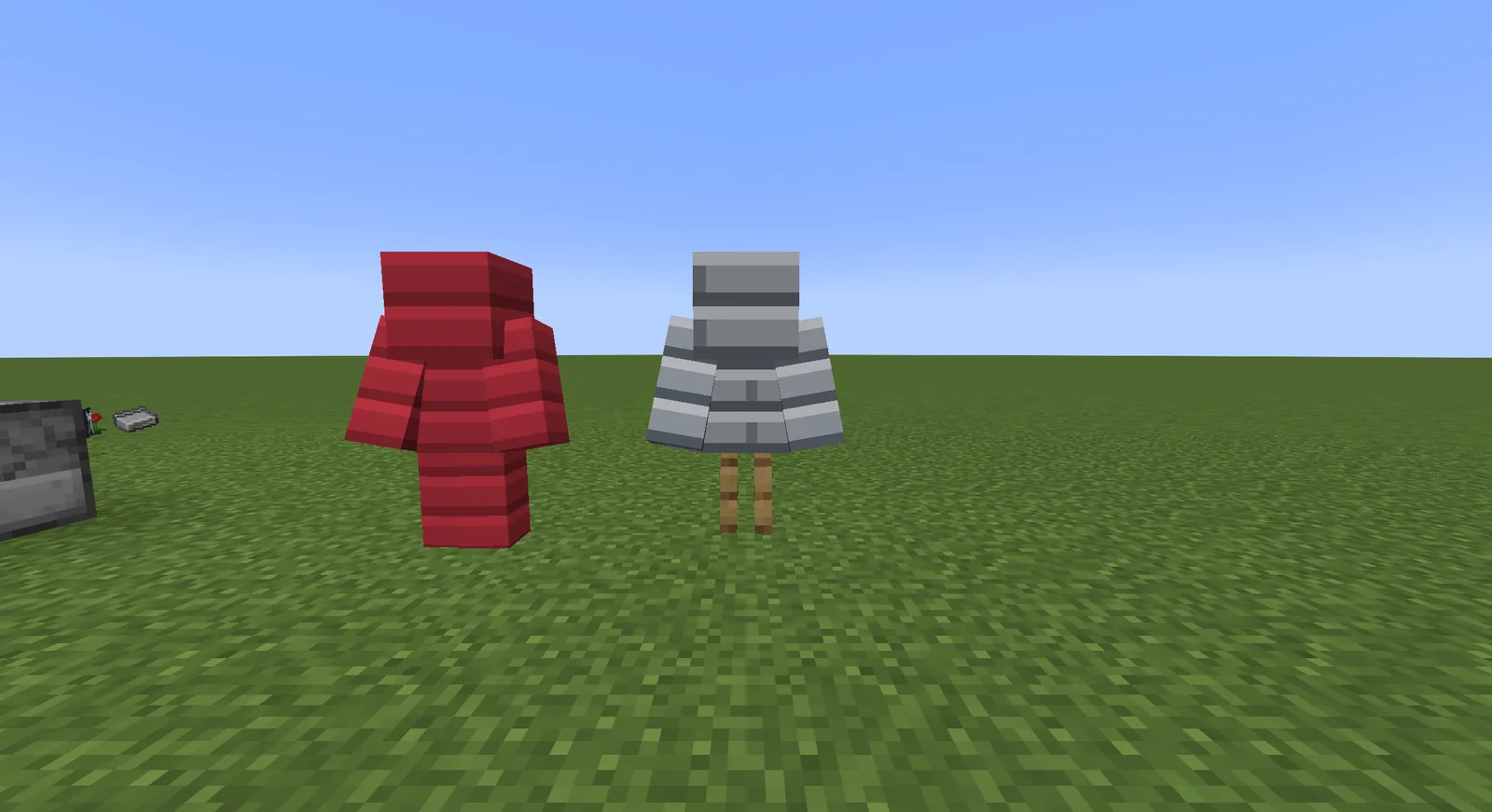 Two sets of armour on stands in the game